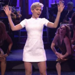 Scarlett Johansson performs provocative dance while hosting SNL in a white dress
